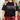 black t-shirt with Christmas-themed text and lights